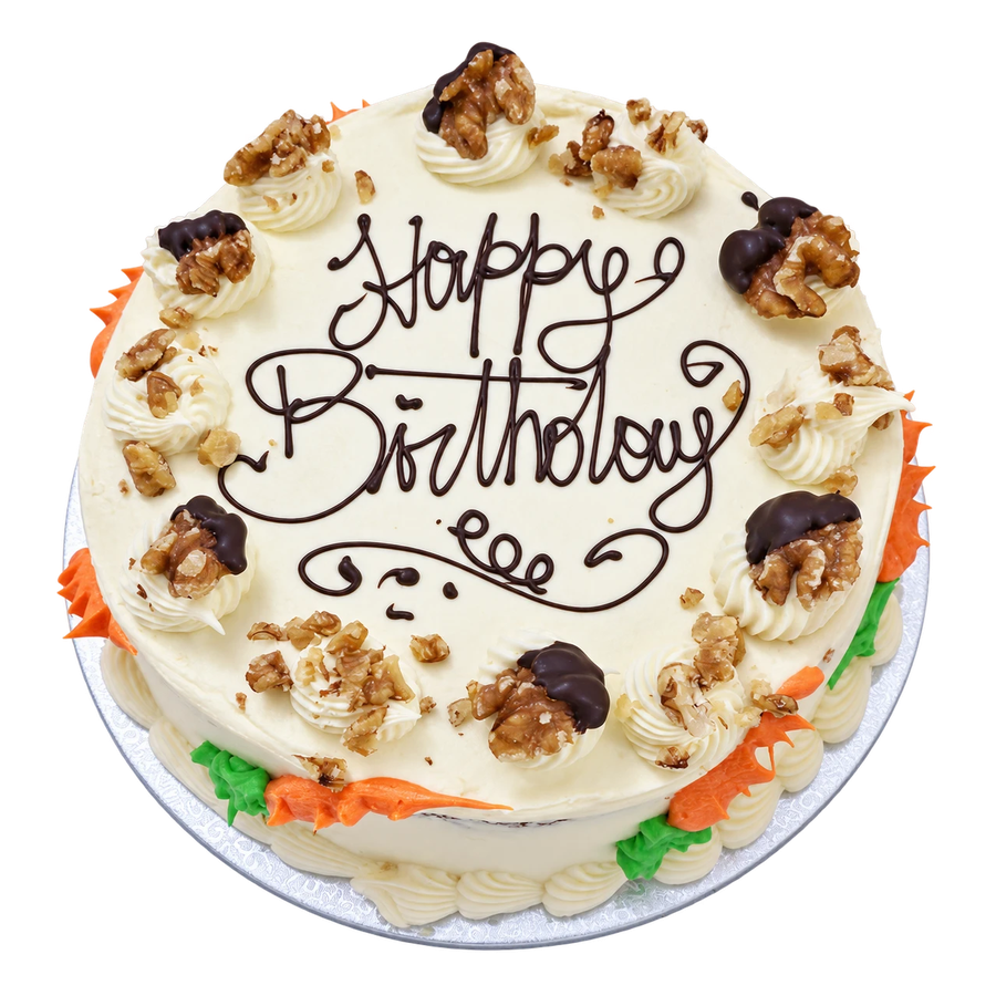 Carrot and walnut cake with cream cheese frosting and a piped birthday message